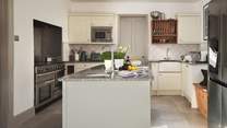 The gorgeous kitchen is full of everything you could possibly need to rustle up a storm