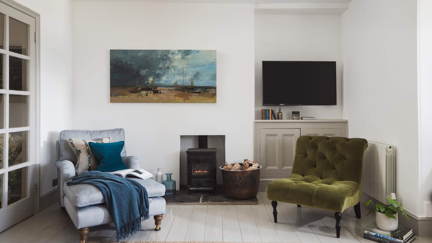 The wood burner offers a cosy nook on cooler days