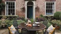 To the front of our elegant, red-bricked cottage lies a private, sheltered courtyard garden