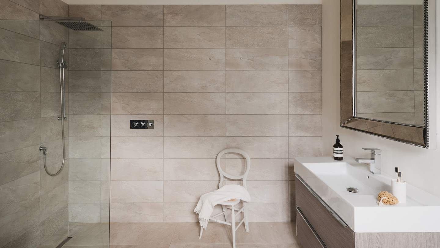 There is also a separate walk-in shower