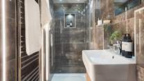 The en suite shower room with walk in shower 