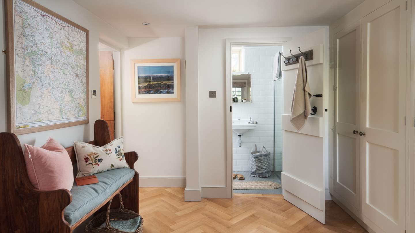 The entrance hall plus downstairs shower room