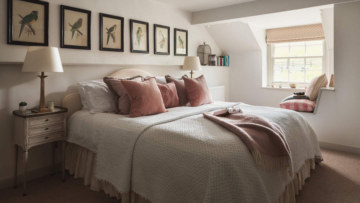 The gorgeous master bedroom in shades of damask pink