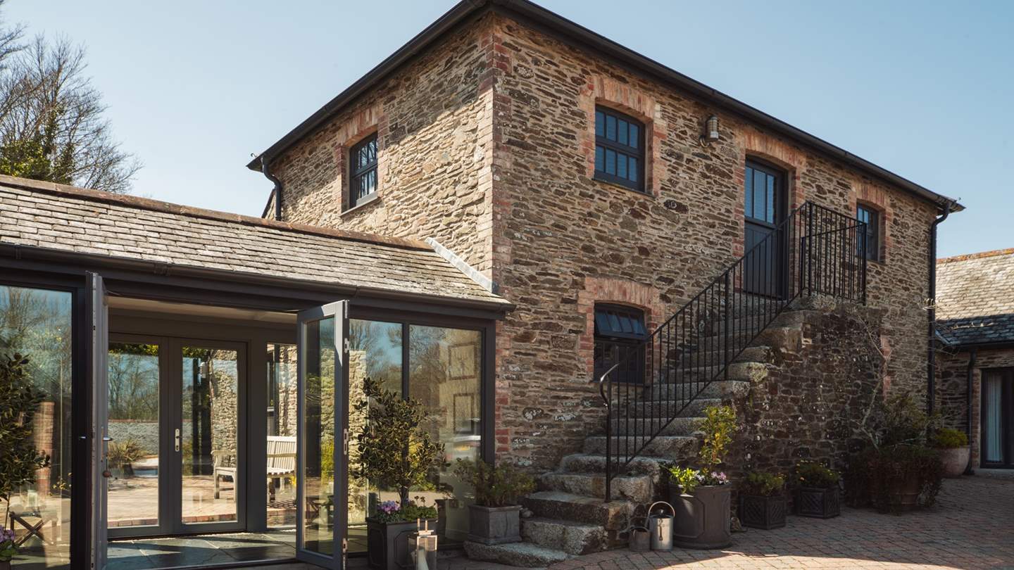 Set on the gorgeous Roseland Peninsula, this is a stunning barn conversion for eight