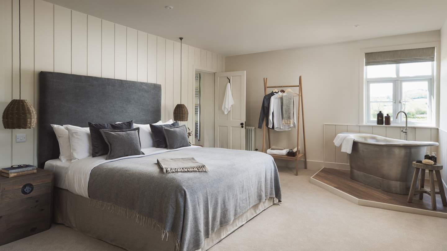 The super king sized bed in the master bedroom just calls for long lie ins