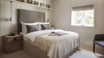 'Cedar' is a delightful bedroom in shades of grey and white