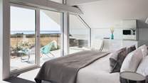 The stunning master bedroom with incredible sea views