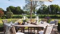 Eating alfresco is a delight in the magical garden