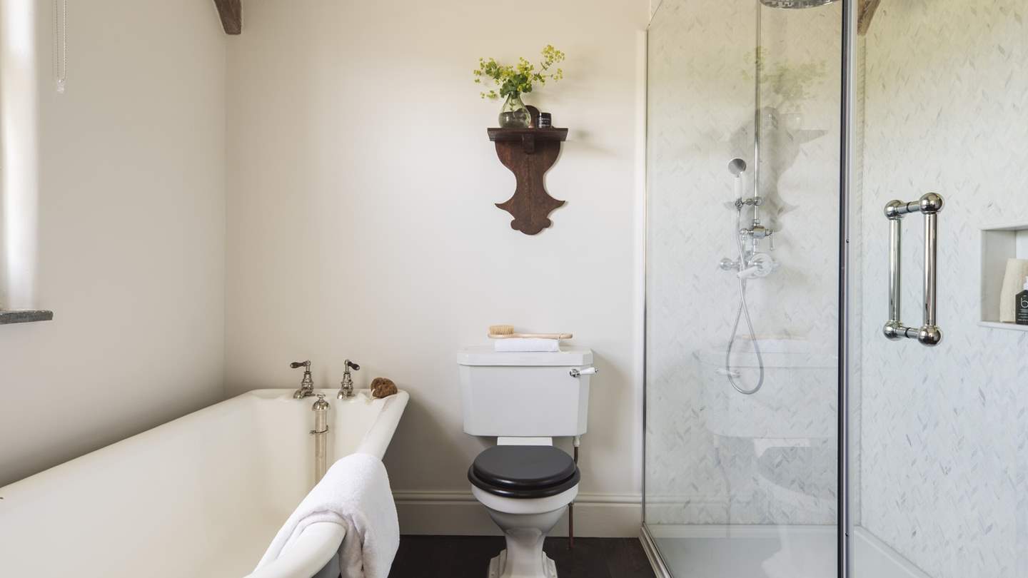 The family bathroom with shower and bath