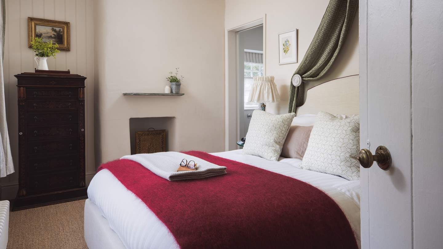 The charming third bedroom with comfy double bed