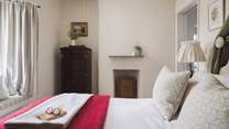 This is a gorgeous, cosy room that will lull you off to the deepest of sleeps...