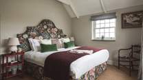 The gloriously floral fifth bedroom with super king zip and link bed