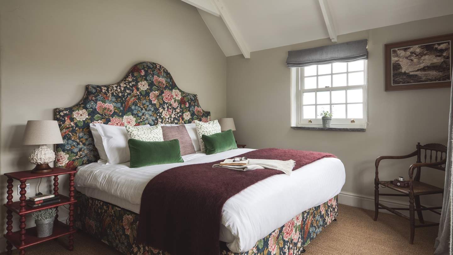 The gloriously floral fifth bedroom with super king zip and link bed