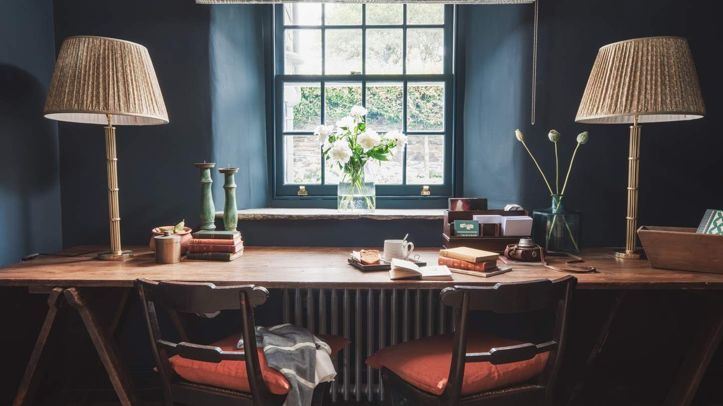 For those needing to catch up on some work, the double desk is available in a tucked-away study