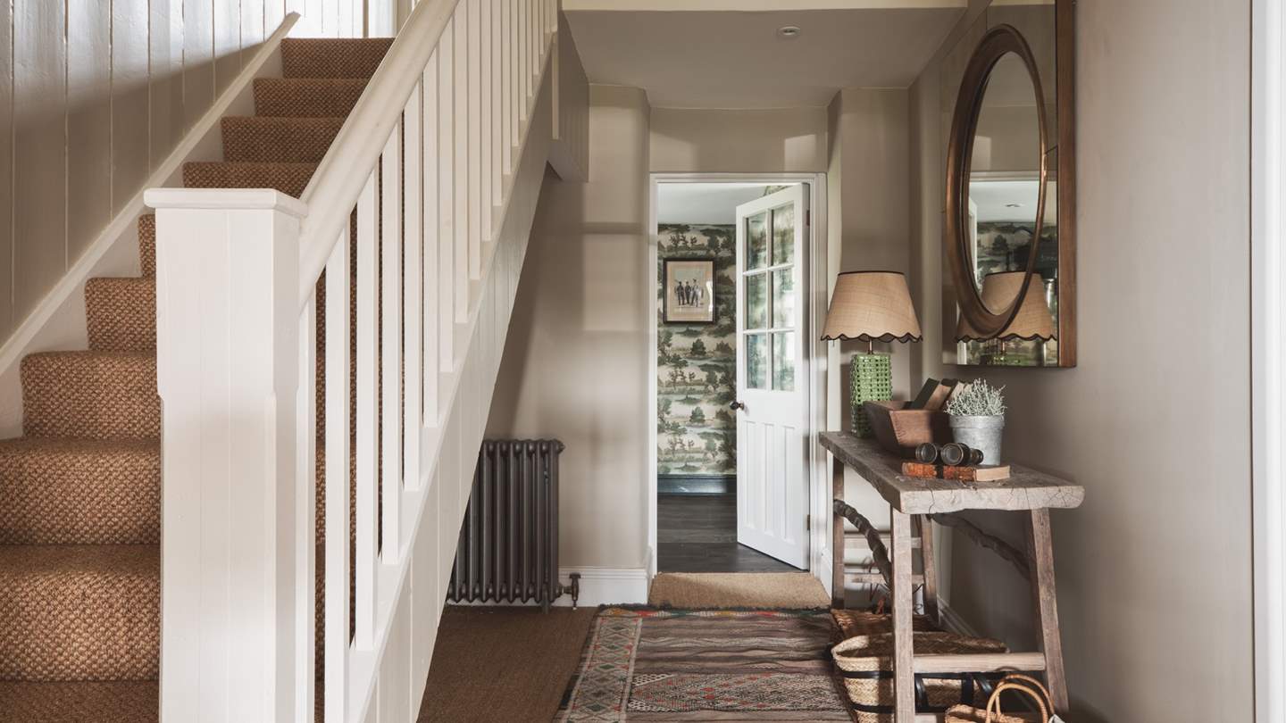 Stairs lead up to the bedrooms