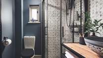 This bedroom has a pretty en suite shower room 