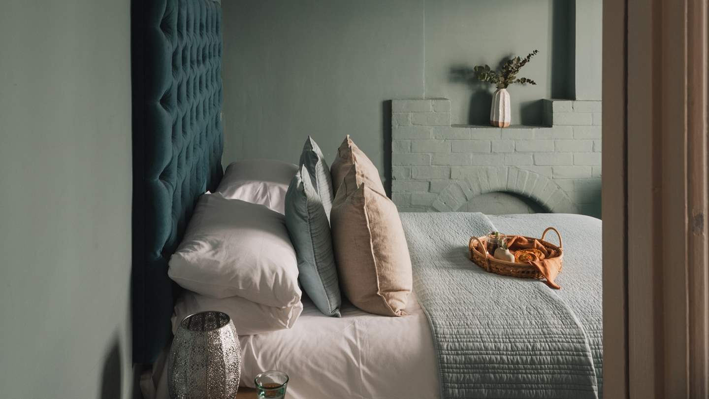 The second bedroom is just lovely in shades of teal