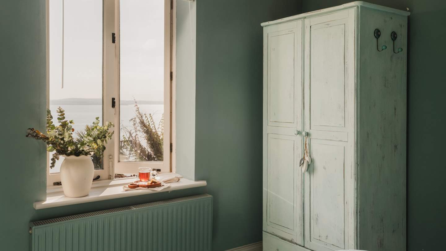 This darling bedroom promises endless beautiful ocean views