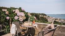 Blessed with stunning sea views and bountiful flowers, this truly is an idyllic spot and the perfect space to while away lazy afternoons
