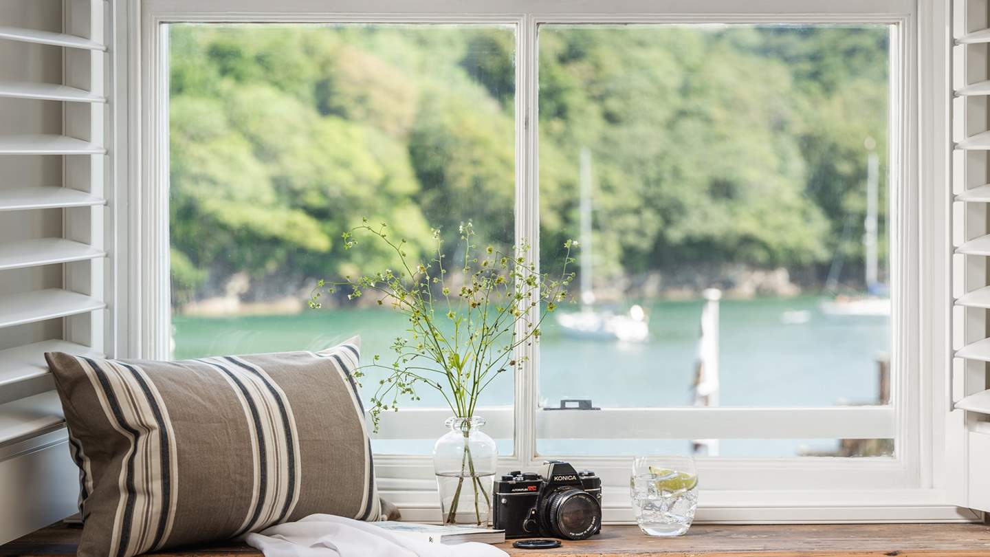 While away the afternoon and watch boats pass by your window