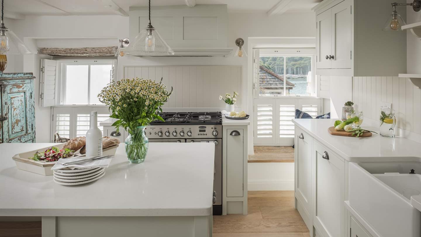 Enjoy a glimpse of the river from the exquisite kitchen