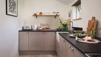 The galley kitchen is fully equipped with everything you'll need to rustle up meals