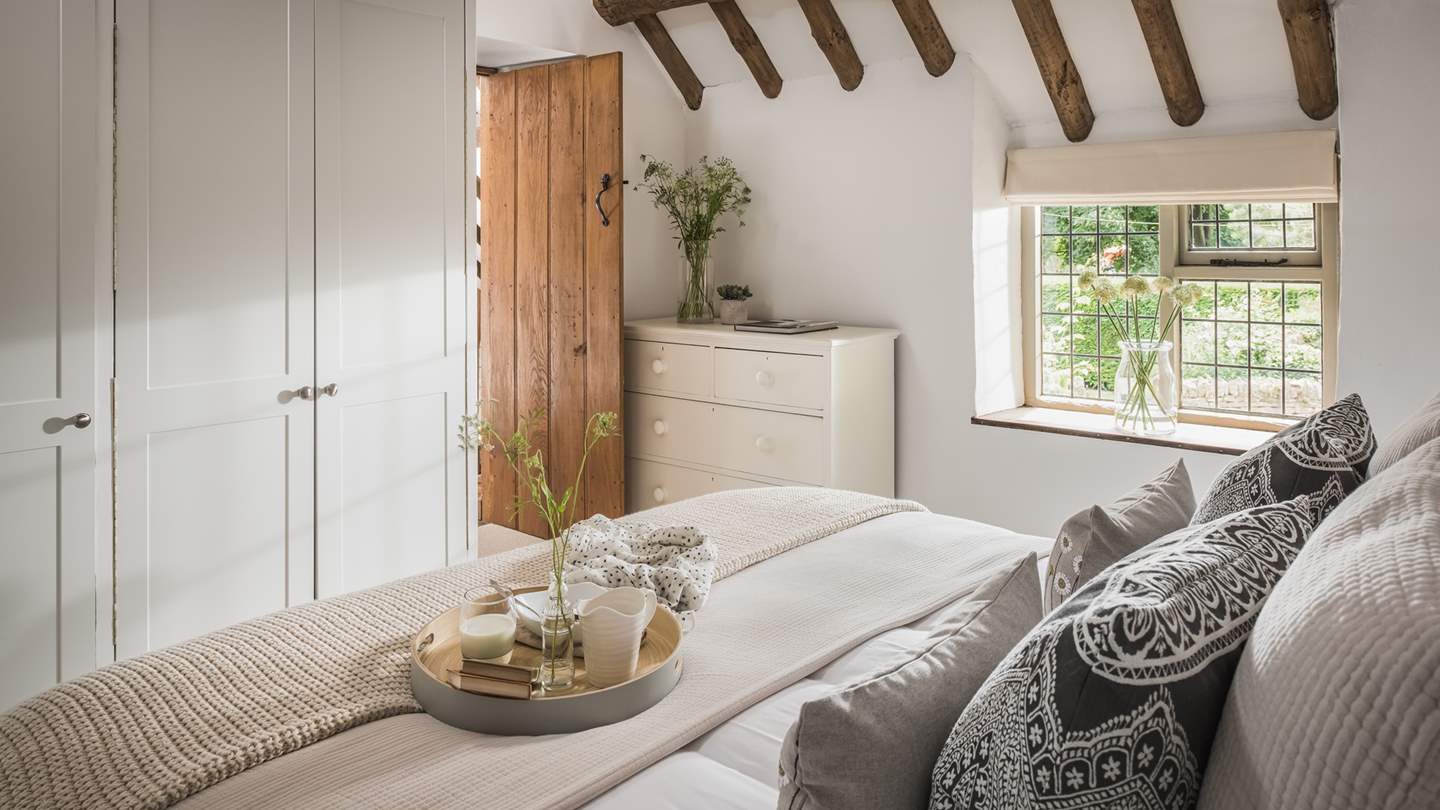 Take the gorgeous oak staircase up to a galleried landing where you’ll discover two delightful bedrooms to choose from