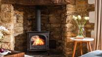 The flickering wood burner is a welcome sight