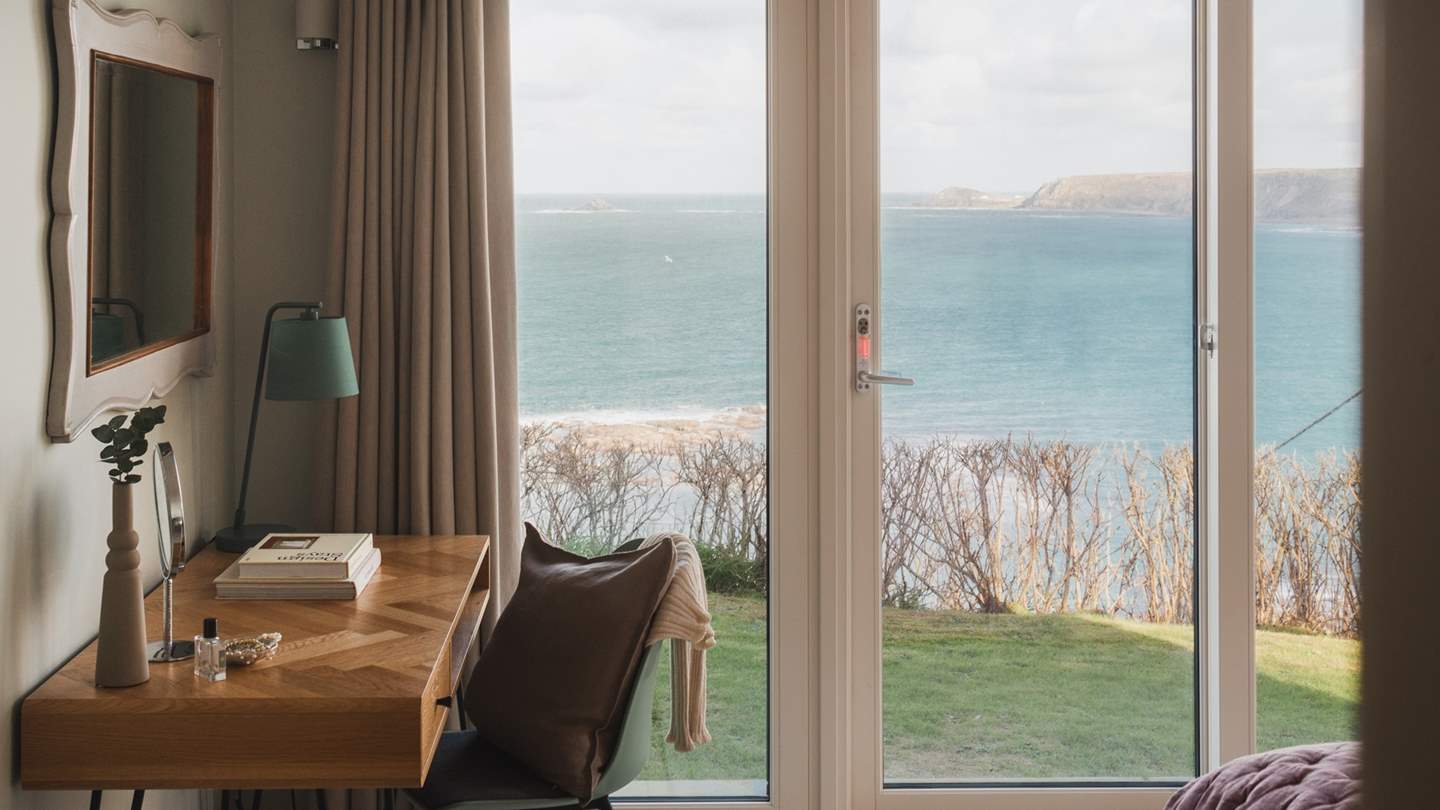 Push open the patio doors on a balmy day and enjoy a peaceful spot on the cliff top terrace