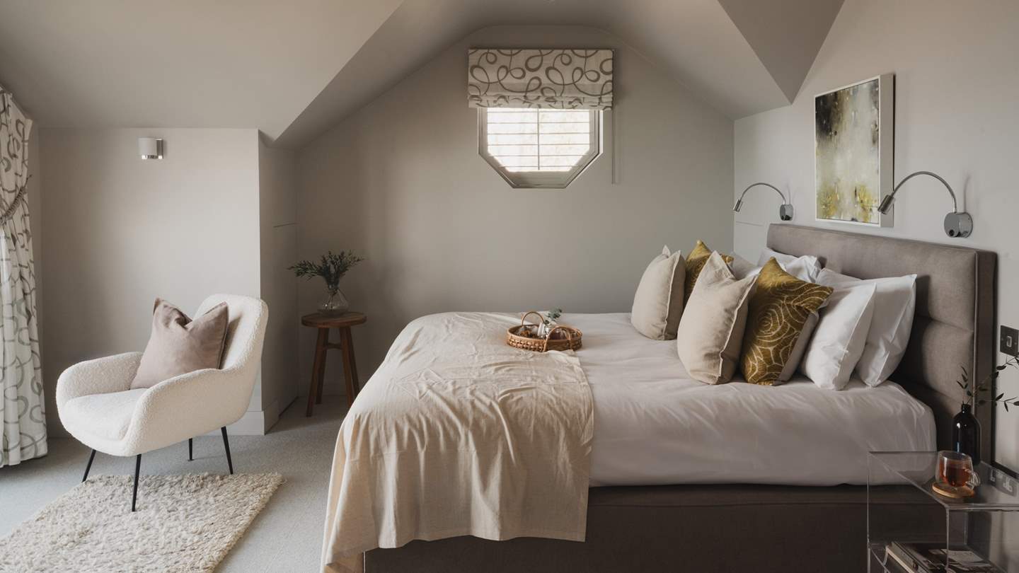 The beautiful master bedroom complete with a super king-sized bed 