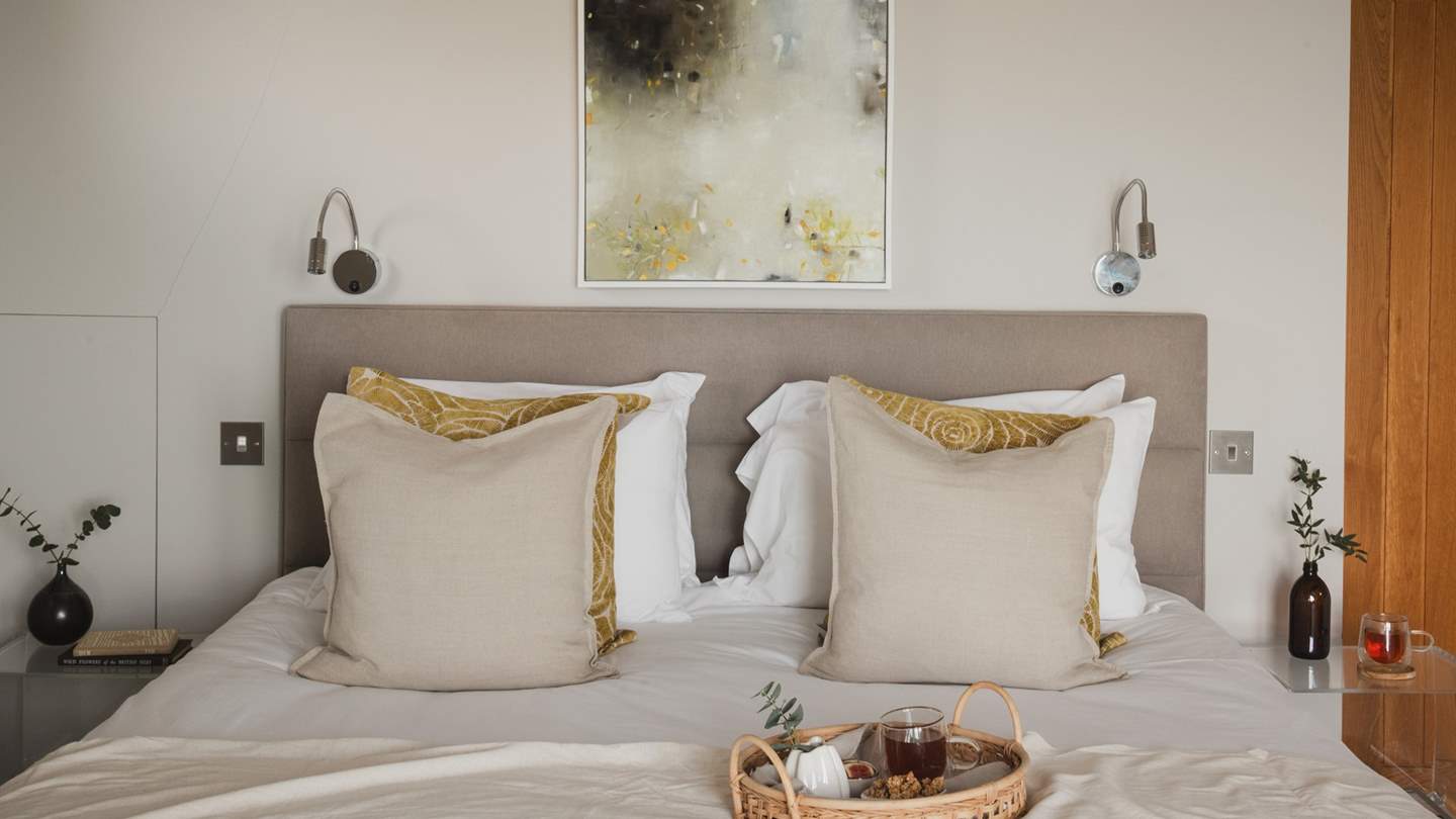 Residing on the first floor, the master bedroom beckons for a peaceful nights slumber