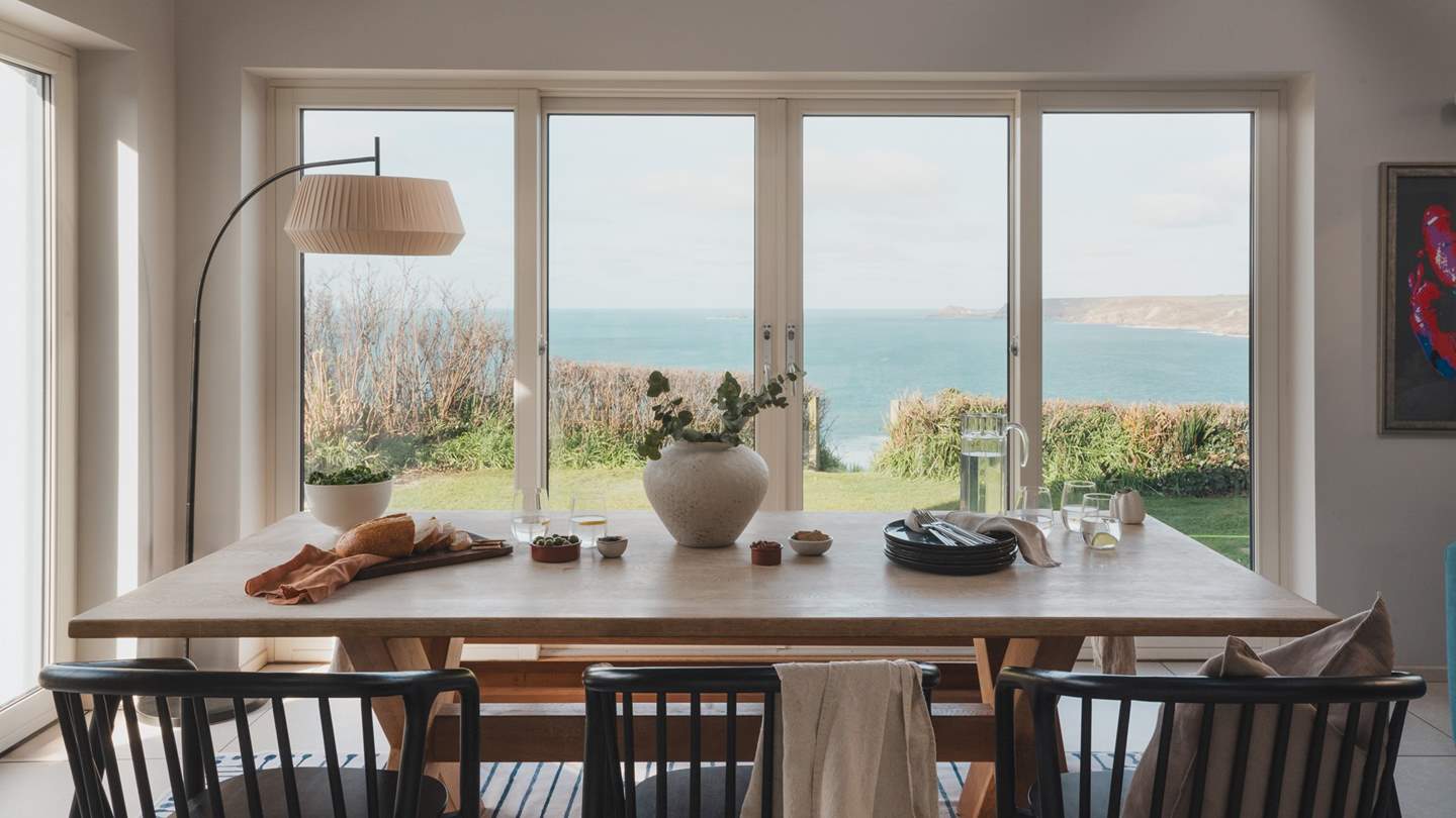 Push open the patio doors on summer days and let the ocean air flood into the kitchen as delicious plates are served around the table


