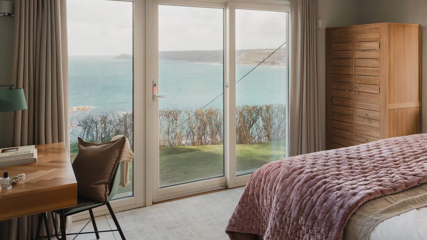 Dressed in shades of plush pink with cloud soft linens for a restful nights repose 