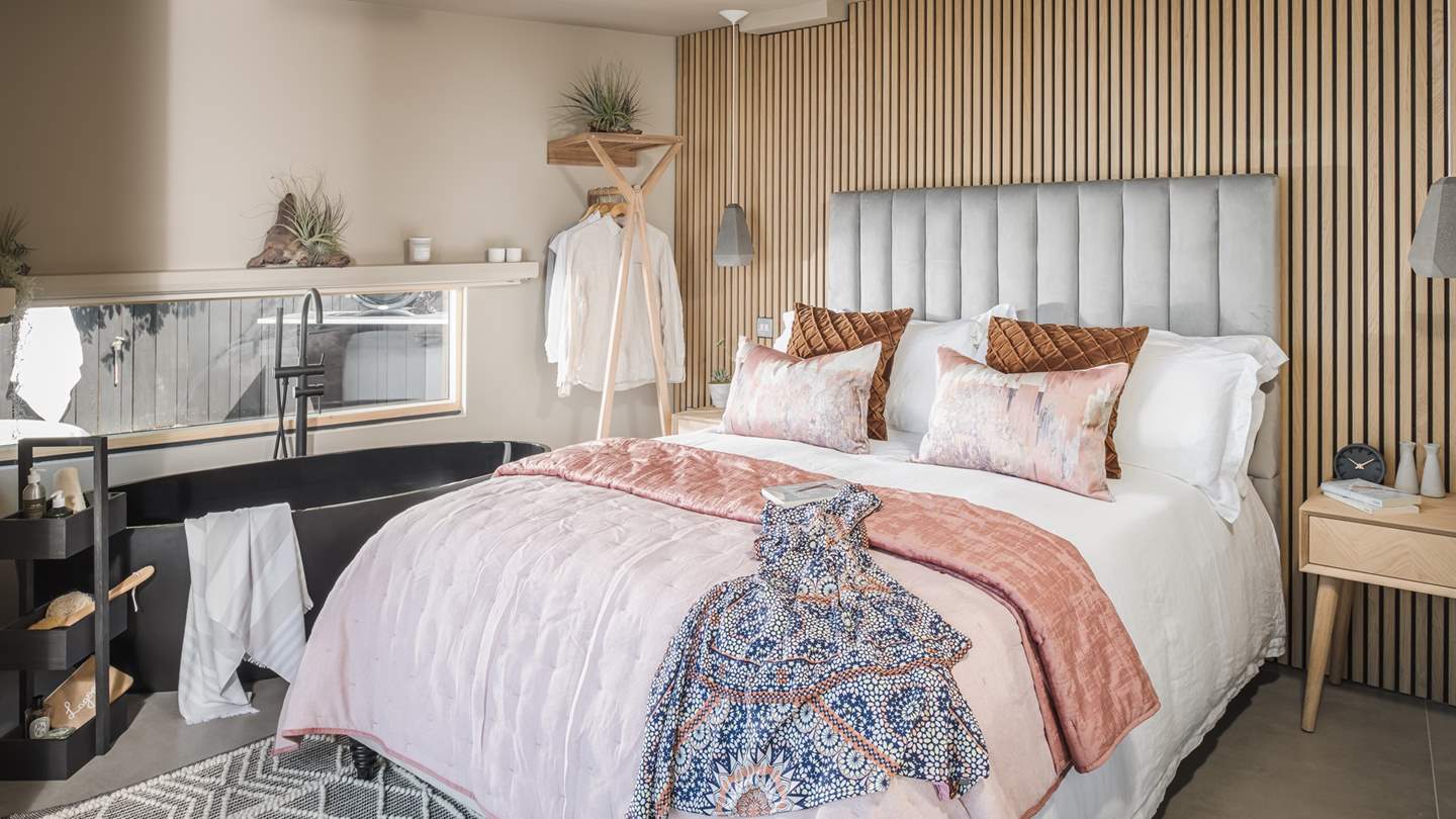 Fika’s heavenly divan lies in front of a stunning beech panelled feature wall, where concrete light fittings and galvanised switches create a desirable industrial style.