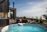 Relish a relaxed barbecue lunch before champagne in the hot tub as the sun begins to set...