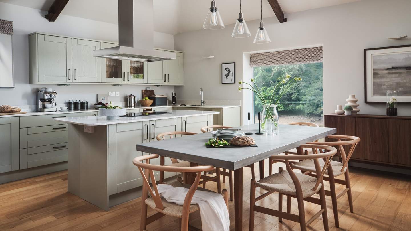 Simply beautiful in soothing neutral shades, with a sociable island feature and gorgeous dining table for six...