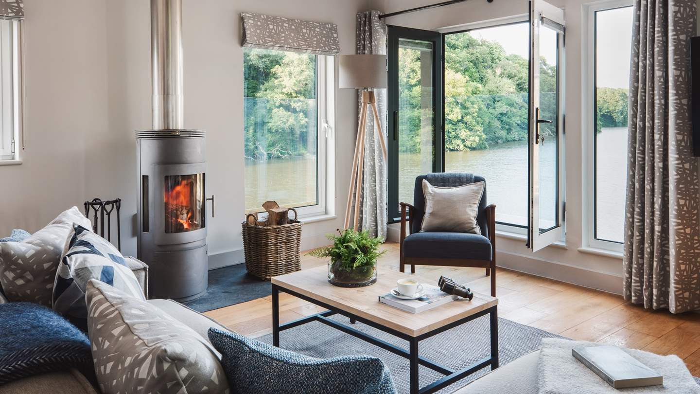Settle in beside the wood burning stove for uninterrupted views over the water...