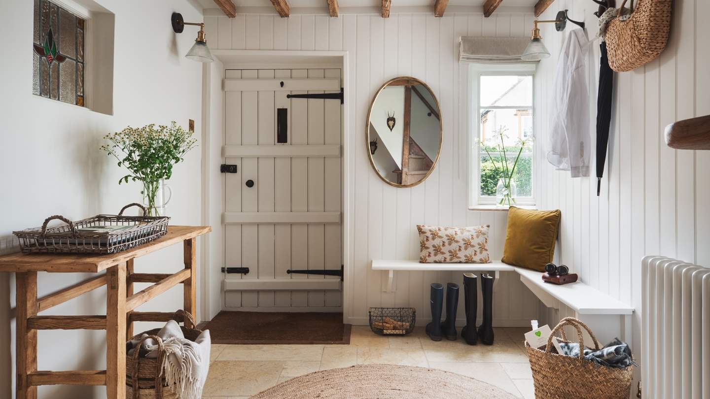 We just love the welcoming entrance hall with plenty of space for muddy wellies and coats after a stomp through the woods