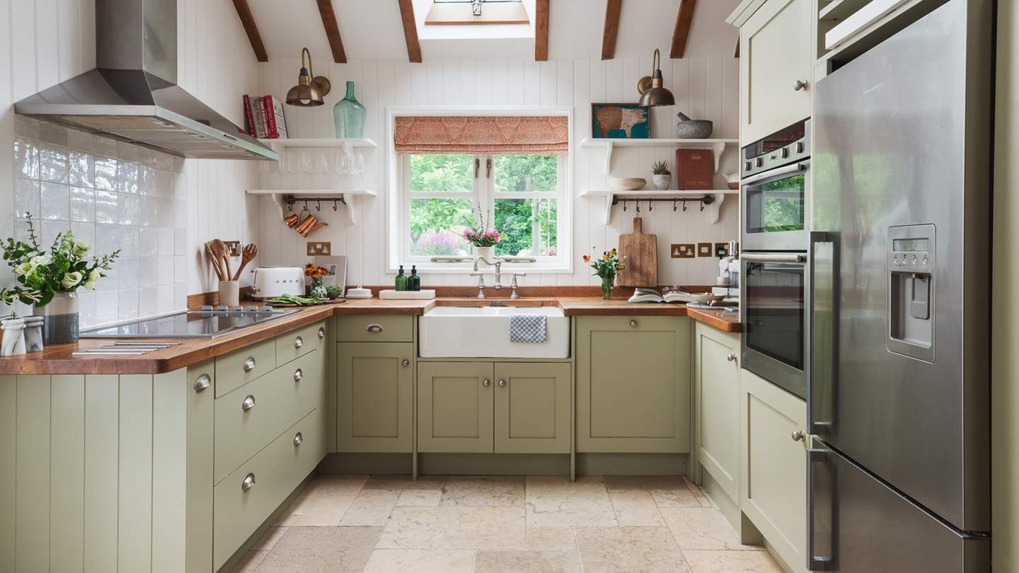 The country style kitchen is fully equipped with everything you'll need to rustle up feasts