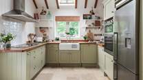 The country style kitchen is fully equipped with everything you'll need to rustle up feasts