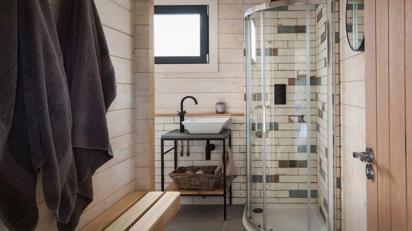 Freshen up in the stunning shower room...