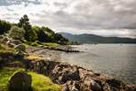 The pebbly beach by Fern Cottage just waits to be explored