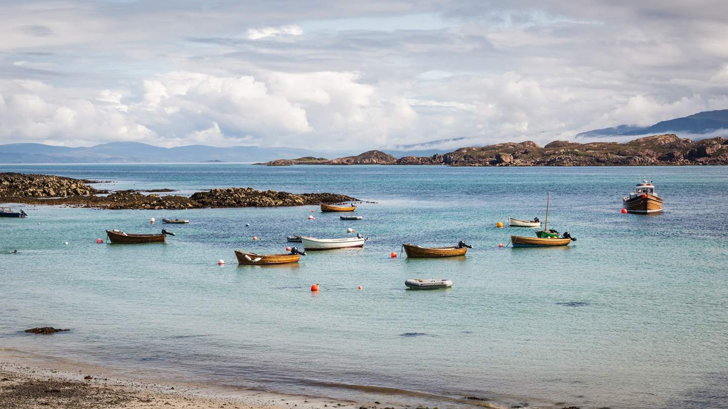 Fishing boats hint of the incredible seafood available to try during your stay