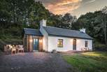 As the sun sets, Fern Cottage offers a cosy escape at the end of the day