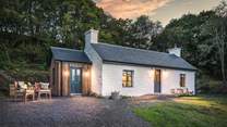 As the sun sets, Fern Cottage offers a cosy escape at the end of the day