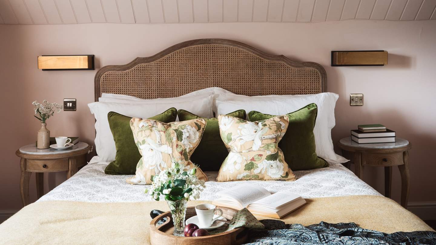 Upstairs you’ll find the two further bedrooms, adorned with a beautiful vintage style...