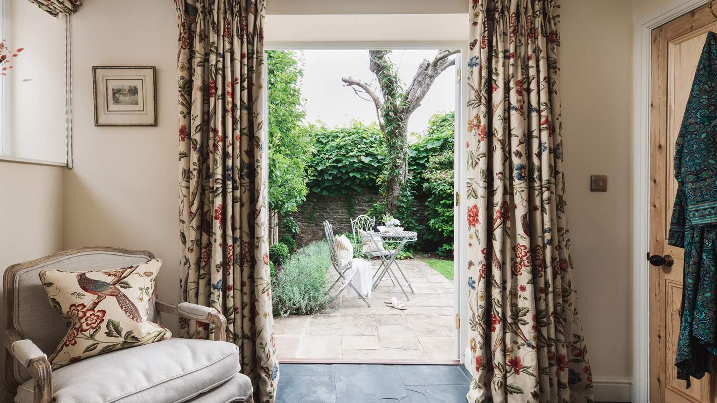 Outside the downstairs bedroom there’s a wrought iron table and chairs for two – just perfect for a morning coffee