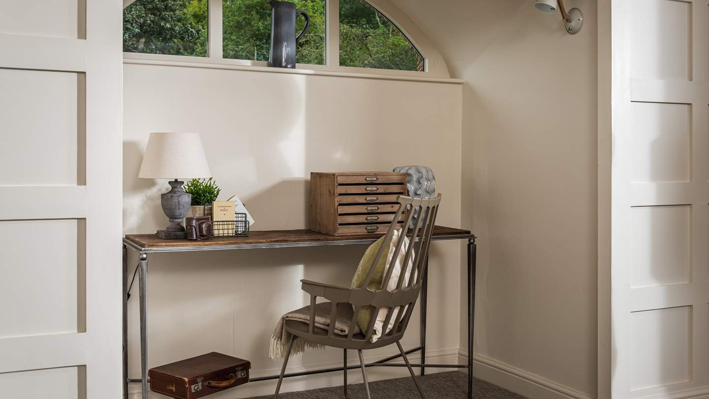 In addition there's a sweet study area, just perfect for working in a sanctuary of curated cosiness