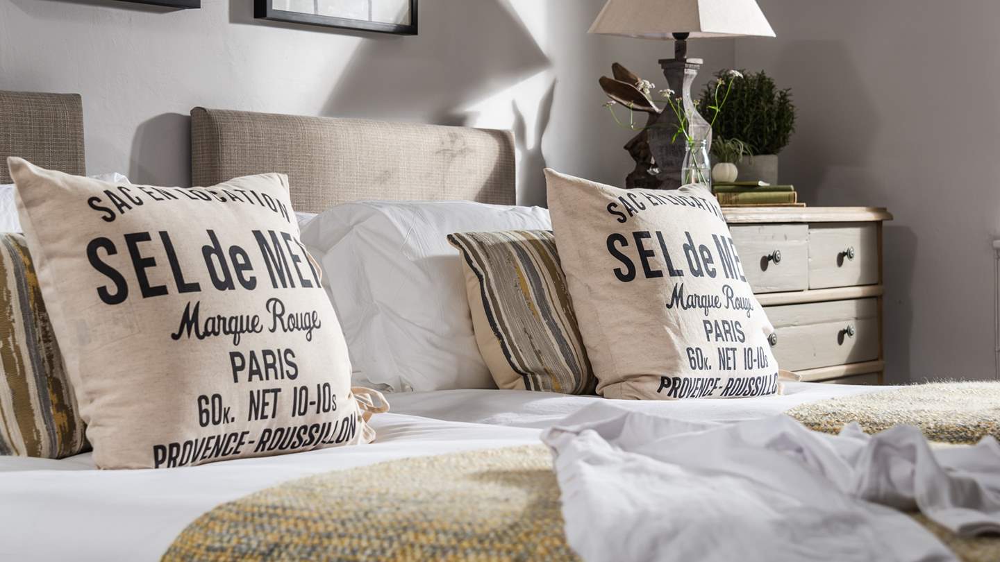 Adorned in soothing neutral tones and luxurious linens for tranquil moments