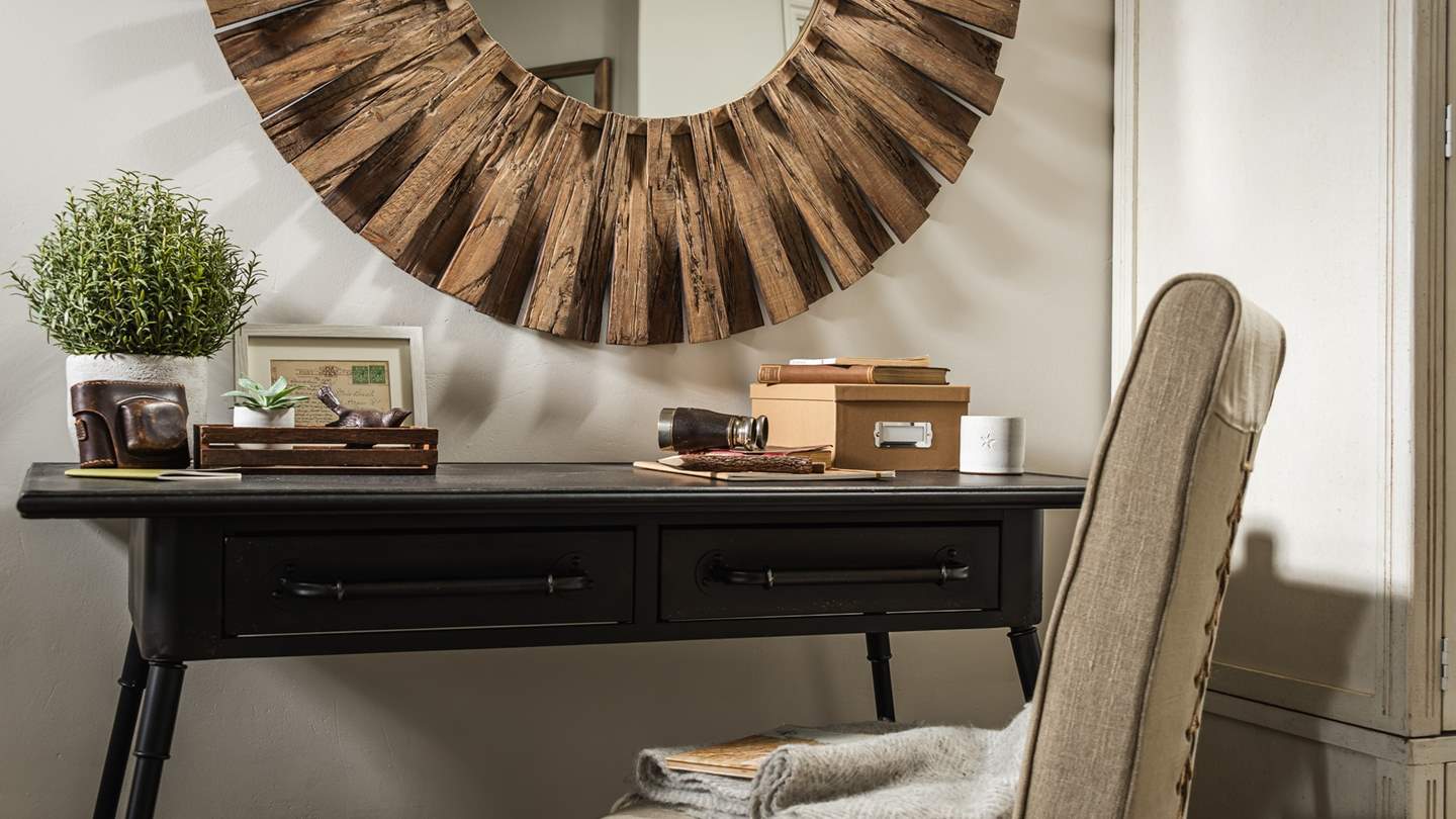 The charming desk allows for peaceful moments if you need to catch up on an email or two...